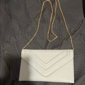 Elegant Cream Clutch with Gold Chain